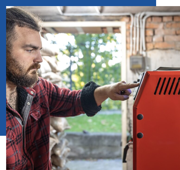 Man in garage turning on a generator